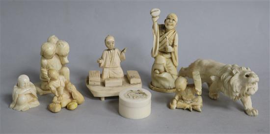 A group of Japanese ivory okimono and a jar, late 19th / early 20th century